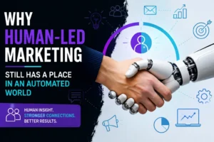 Human and robotic hands working together to represent human-led marketing in an automated world.